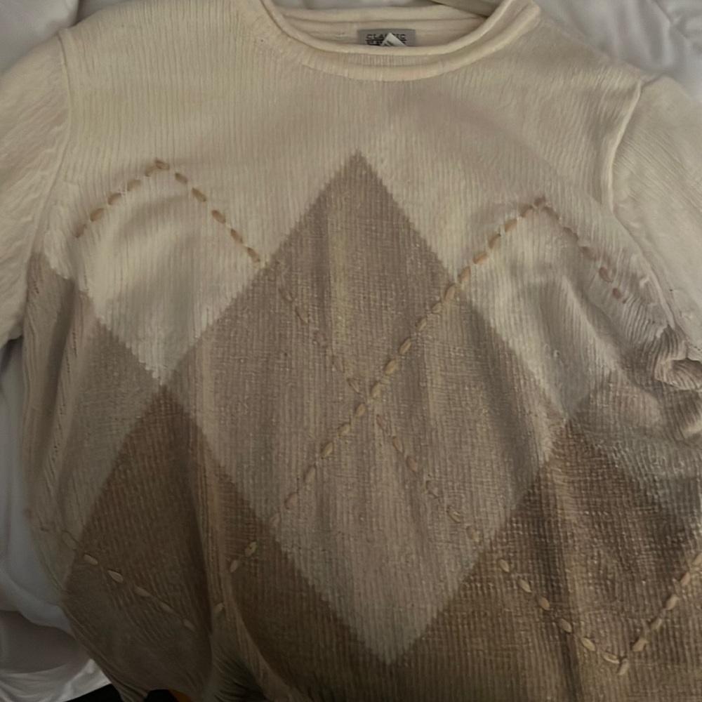Cream colored argyle sweater
